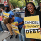 Student loan borrowers stage a rally in front of The White House to celebrate President Biden canceling student debt and to begin the fight to cancel any remaining debt on August 25, 2022, in Washington, DC.